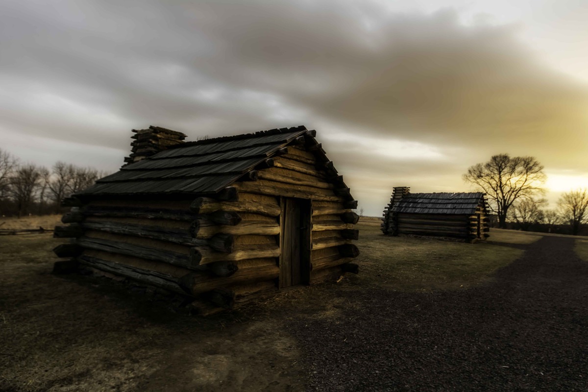 Two Huts at Dawn